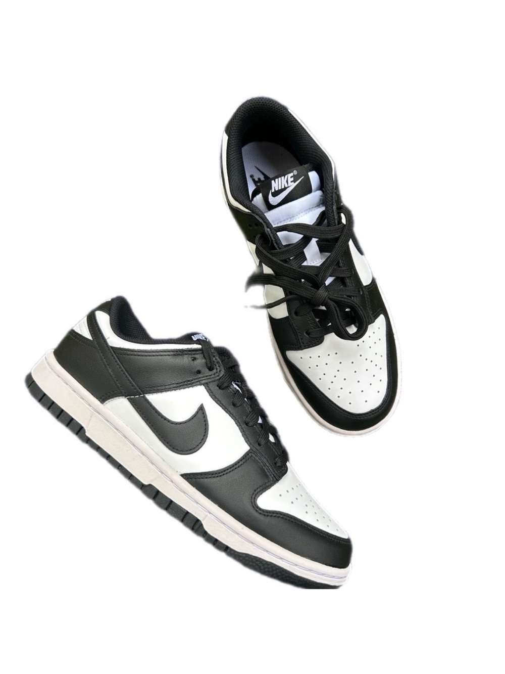 Nike Women’s Black and White Low-Top Sneakers — Swoosh Detail